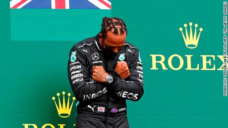 Lewis Hamilton adopts a Black Panther gesture on the podium of the Belgian Grand Prix in tribute to actor Chadwick Boseman who died aged 43 on Friday. 