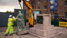 A statue of slave trader Robert Milligan is removed near the Museum of London Docklands in June.