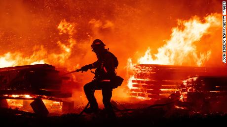 California wildfires have burned more than 2 million acres and prompted power outages for more than 170,000
