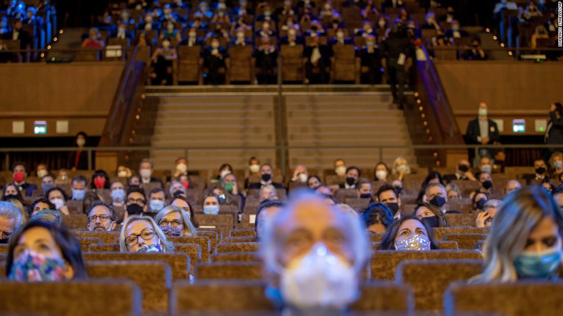 People wear face masks and sit spread apart at the opening ceremony of the Venice Film Festival in Italy on September 2.
