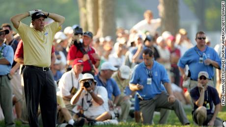 Mickelson waits to hit from the rough during the final round of the 2006 U.S. Open Championship.