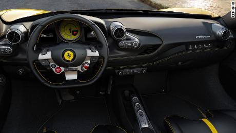 The Ferrari F8&#39;s start button is on the steering wheel. For the passenger, there&#39;s a narrow touchsreen that can show a speedometer and the engine speed.