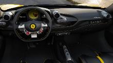 The Ferrari F8&#39;s start button is on the steering wheel. For the passenger, there&#39;s a narrow touchsreen that can show a speedometer and the engine speed.