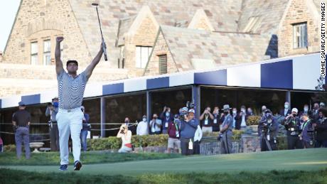 DeChambeau celebrates on the 18th green after winning the 120th US Open Championship.