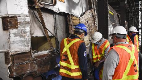 A train derailed on a subway platform in Manhattan Sunday. No passengers were injured.