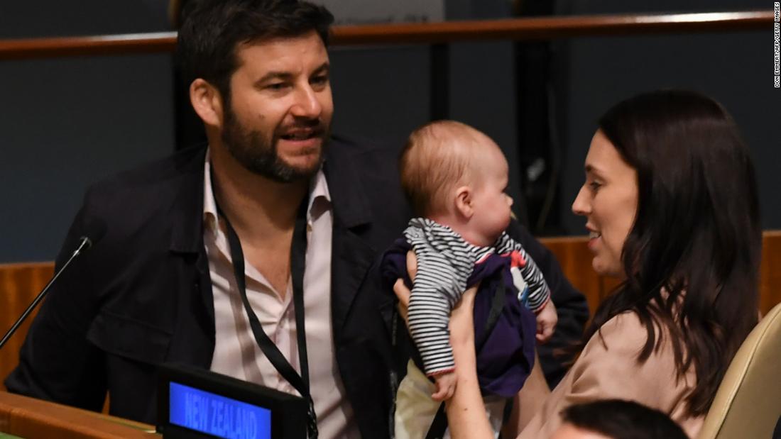 Jacinda Ardern holds her daughter Neve Te Aroha Ardern Gayford, as her partner Clarke Gayford looks on during the Nelson Mandela Peace Summit on September 24, 2018, a day before the General Debate of the General Assembly at the United Nations in New York. 