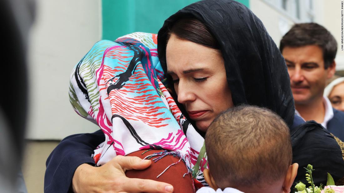 Prime Minister Jacinda Ardern wears a hijab as she embraces a Muslim woman at the Kilbirnie Mosque in Wellington, two days after a White supremacist attacked two mosques in Christchurch on March 15, 2019.