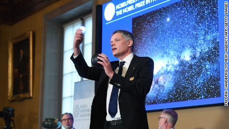Ulf Danielsson, member of the Royal Swedish Academy of Sciences, speaks at a news conference following the announcement in  Stockholm, Sweden, on October 6.