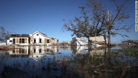 Structures sit in floodwaters Saturday in Creole, Louisiana.