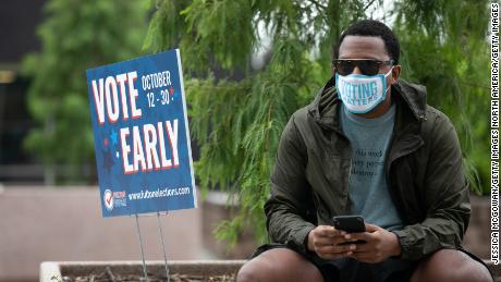 Cadarius Parks sits outside of State Farm Arena, Georgia&#39;s largest early-voting location, after casting his ballot on October 12, 2020, in Atlanta.