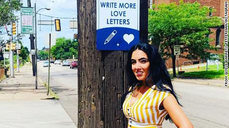 One of Braddock&#39;s signs encouraged folks to write more love letters, which Fetterman enjoys doing. 
