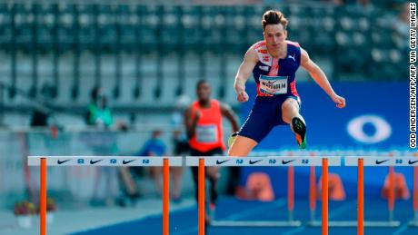 Warholm clears a hurdle while competing in Berlin earlier this year. 