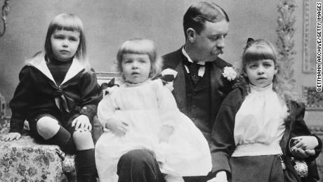 Roosevelt (right) is shown at age 6 with her father and her two brothers.