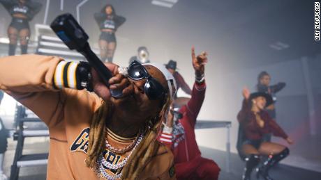 Rapper Lil Wayne performs with 2 Chainz at the 2020 BET Hip Hop Awards.