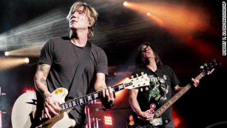 (From left) John Rzeznik and Robby Tacak perform at the Xfinity Center on Aug. 17, 2019, in Mansfield, Mass. The Goo Goo Dolls will release a holiday album.