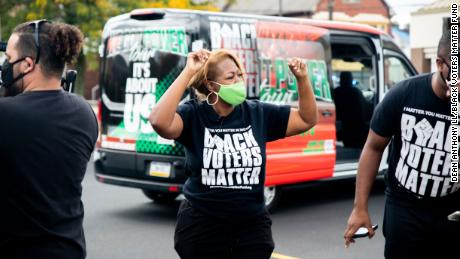 Brown is pictured in Ohio, along with a Black Voters Matter Van.