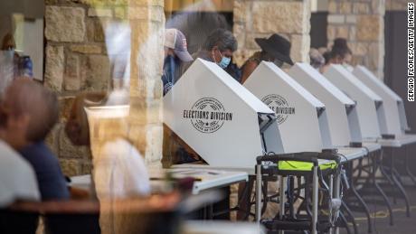 People cast their ballots at a polling location on October 13 in Austin, Texas. 