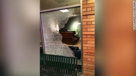 Police declared a riot after people damaged businesses in the city.