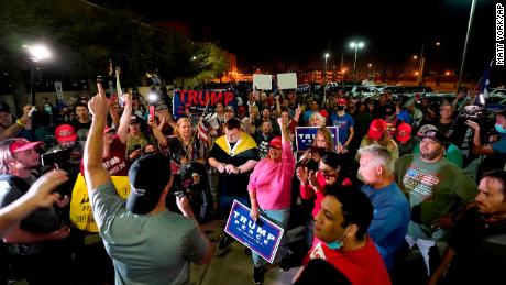 President Donald Trump&#39;s supporters rally on Wednesday night outside the Maricopa County vote counting center in Phoenix.