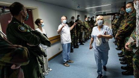 Soldiers are welcomed to the Bois de l&#39;Abbaye hospital in Seraing, in Belgium&#39;s Liege province, on November 2.