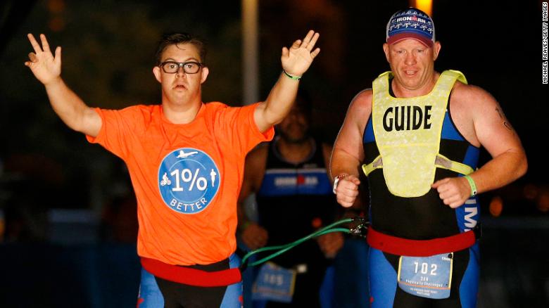 A 21-year-old man has made history as the first person with Down syndrome to complete an Ironman triathlon