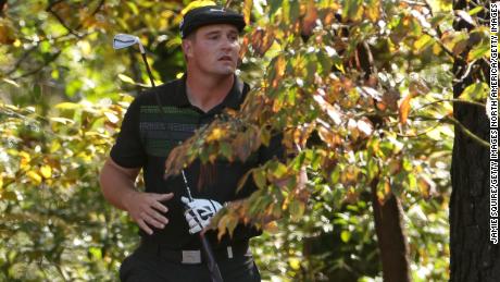 Bryson DeChambeau  played his second shot from the trees on the 11th hole at Augusta.