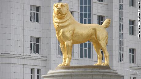 Turkmenistan&#39;s authoritarian leader unveils huge golden dog statue in the capital 
