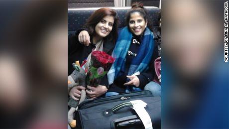 Lina al-Hathloul and her sister Loujain pictured in an undated photo on a train from Brussels. 
