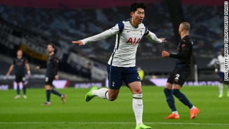 The son celebrates after playing against Manchester City.