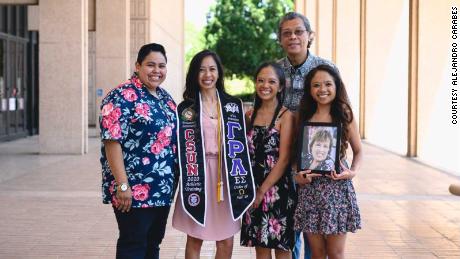 When Tiffany Olega graduated from college in May, her mom wasn&#39;t there to celebrate. Intead, her family posed with a framed photo of her. Rosary Castro-Olega, a nurse, died in March after contracting coronavirus. 