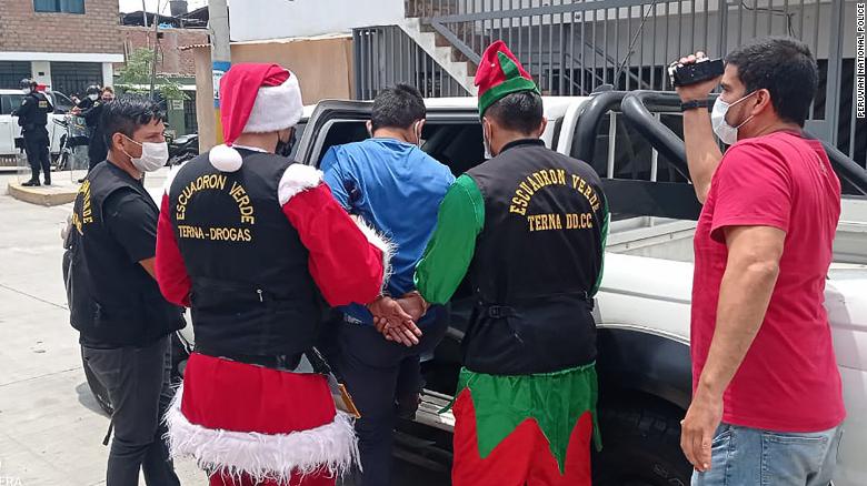 Peruvian police dress as Santa and elves for drug raid