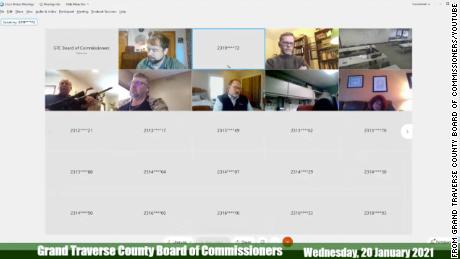 Michigan county commissioner pulls gun out during virtual meeting when resident asked board to denounce Proud Boys 