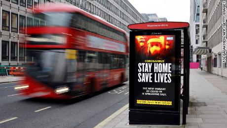 A digital display at a bus station warns pedestrians of the new strain of coronavirus in central London on January 8.