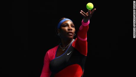 Serena Williams serves against Laura Siegemund at the Australian Open.