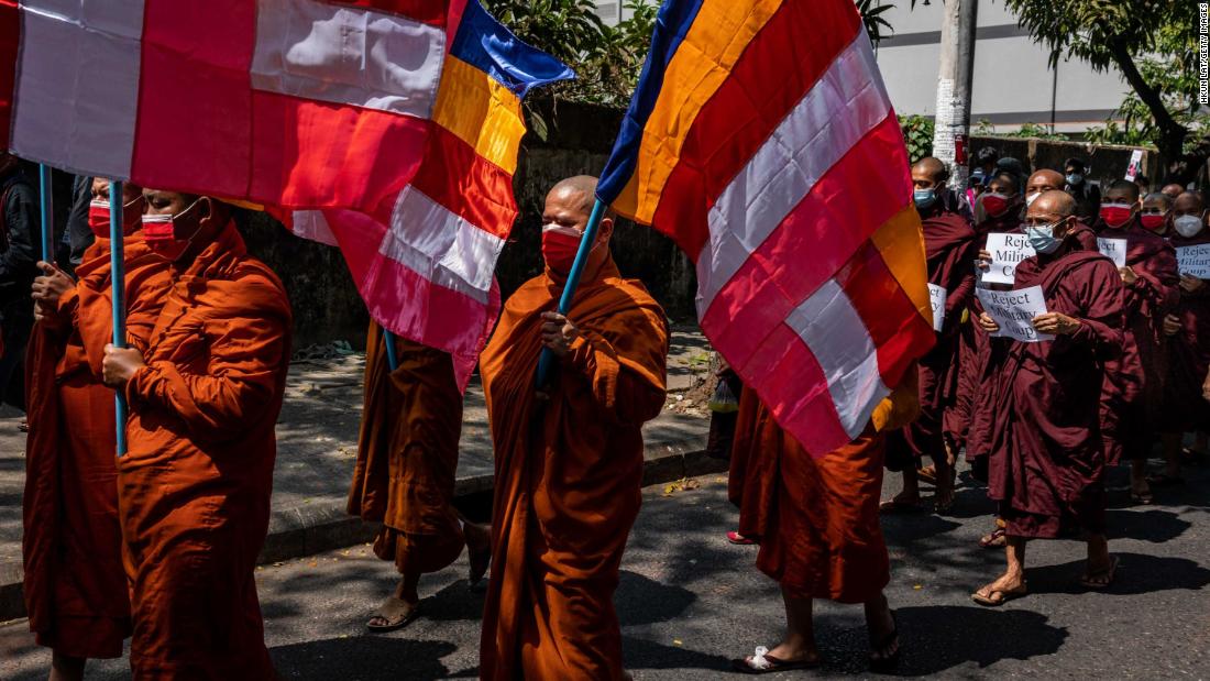 Buddhist monks march during an anti-coup protest in Yangon on February 16.