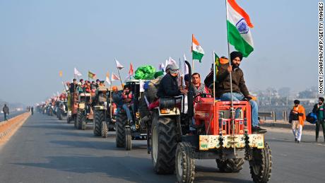 Farmers take part in a tractor rally  in New Delhi on January 26, 2021.