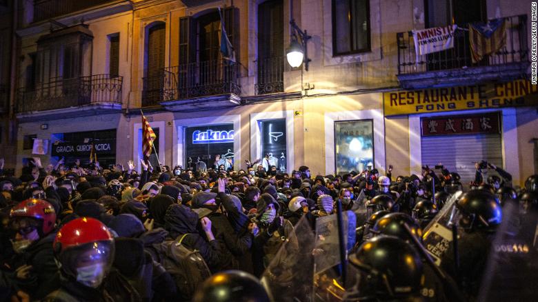 Violent protests over rapper's arrest and accusations of police brutality rock Catalonia for fifth day