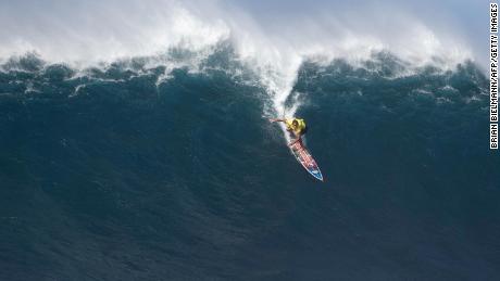 Kemper performs during the big wave riding competition at Jaws in 2019. 