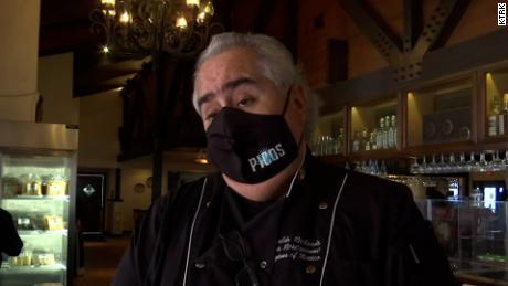 Arnaldo Richards is keeping a mask requirement to protect his family, staff and customers.