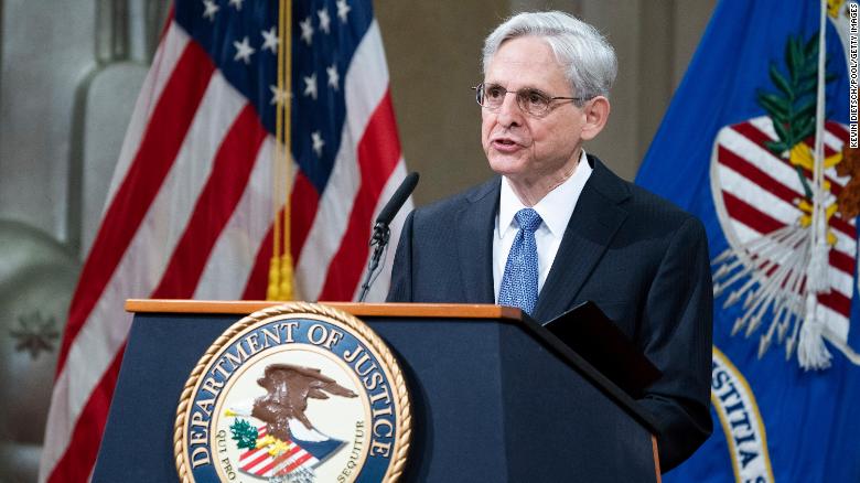 Merrick Garland arrives at Justice Department and delivers an implicit rebuke to Trump era
