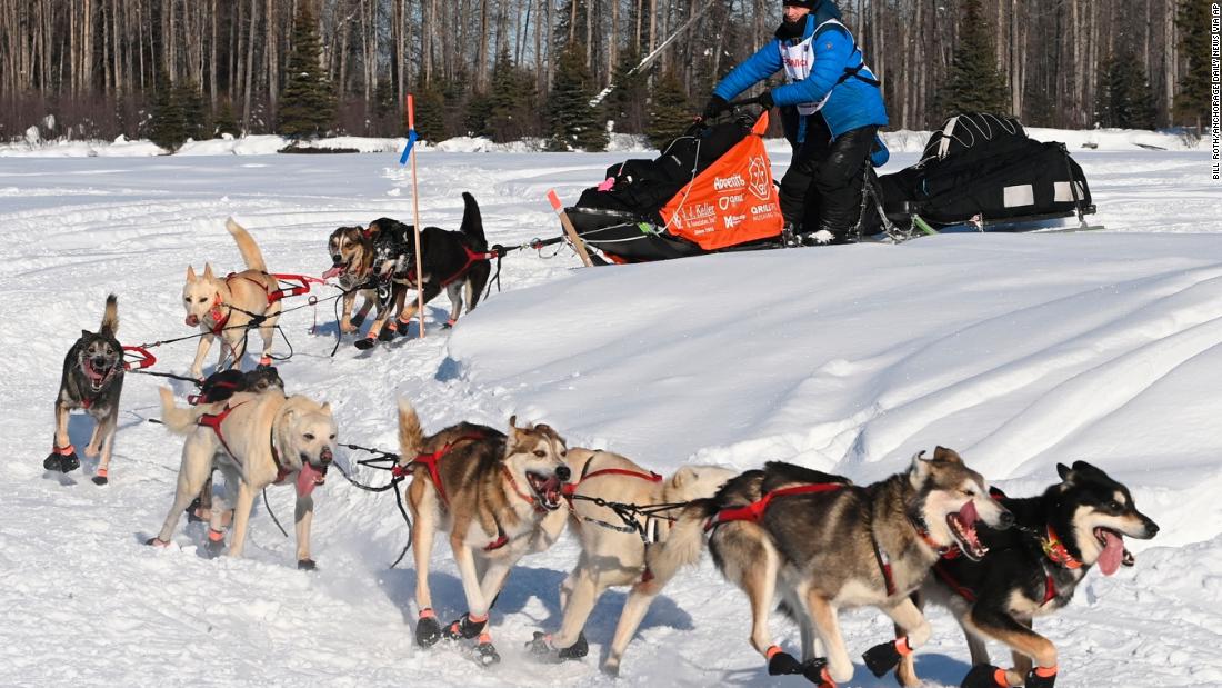 Four-time Iditarod champion Dallas Seavey rounds a corner on the Susitna River.