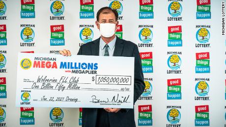 Four people in Michigan are splitting the $  1.05 billion Mega Millions lottery prize
