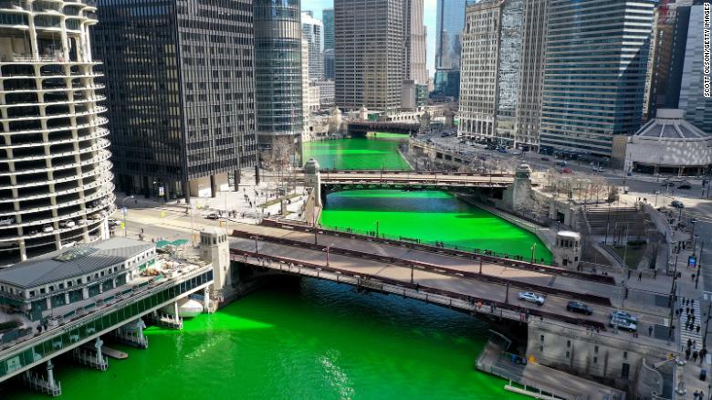 Chicago surprises the city with the traditional green river for St. Patrick's Day after saying the event was canceled