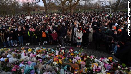 Mourners laid flowers and put down candles at the memorial in Clapham.