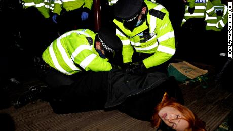 Fury as London police officers break up vigil to murdered Sarah Everard