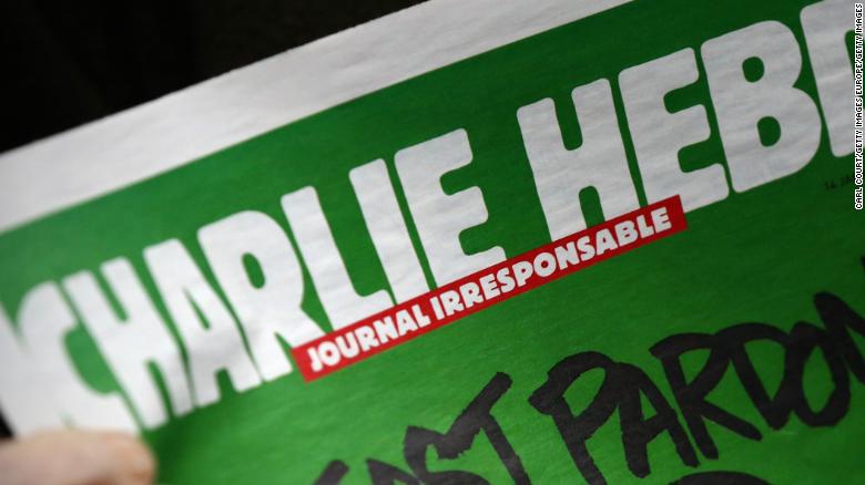 梅根·马克尔（Meghan Markle）和皇后（Queen）的查理周刊（Charlie Hebdo）卡通引发愤怒