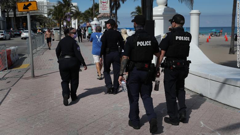 100 arrested as spring break crowds hit Miami Beach despite the pandemic