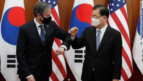 US Secretary of State Antony Blinken bumps elbows with South Korean Foreign Minister Chung Eui-yong in Seoul on March 18.