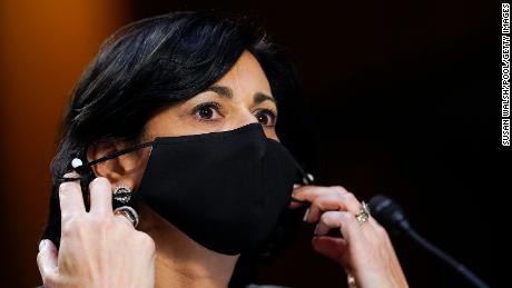 CDC Director Dr. Rochelle Walensky adjusts her mask during a Senate Health, Education, Labor and Pensions Committee hearing on Capitol Hill on March 18, 2021 in Washington, DC
