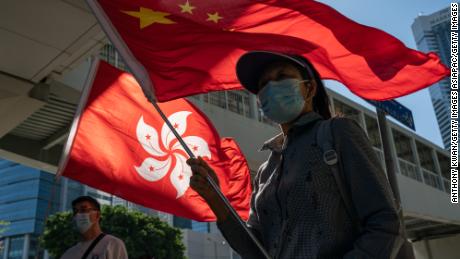 Pro-Beijing supporters gather outside Hong Kong&#39;s Legislative Council on November 12, 2020.